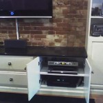 All components housed in cabinet below